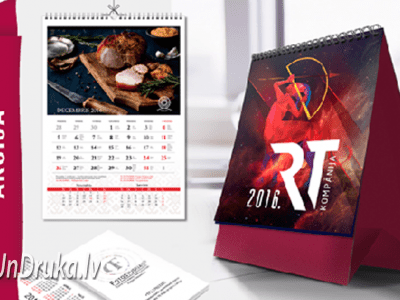 Sienas un galda kalendāri ar sarkanu lenti un uzrakstu akcija