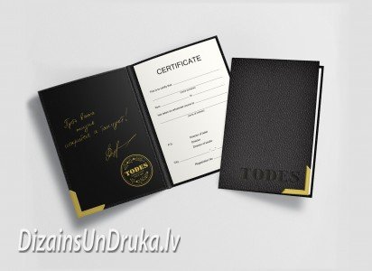 Black diploma covers with gold corners and a certificate visible inside